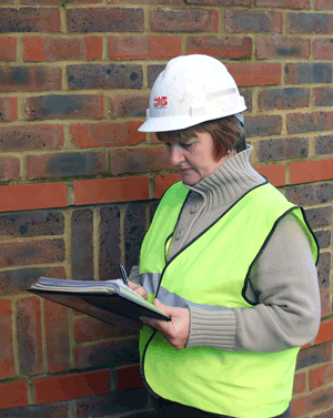 Woman-holding-clipboard-in-front-
